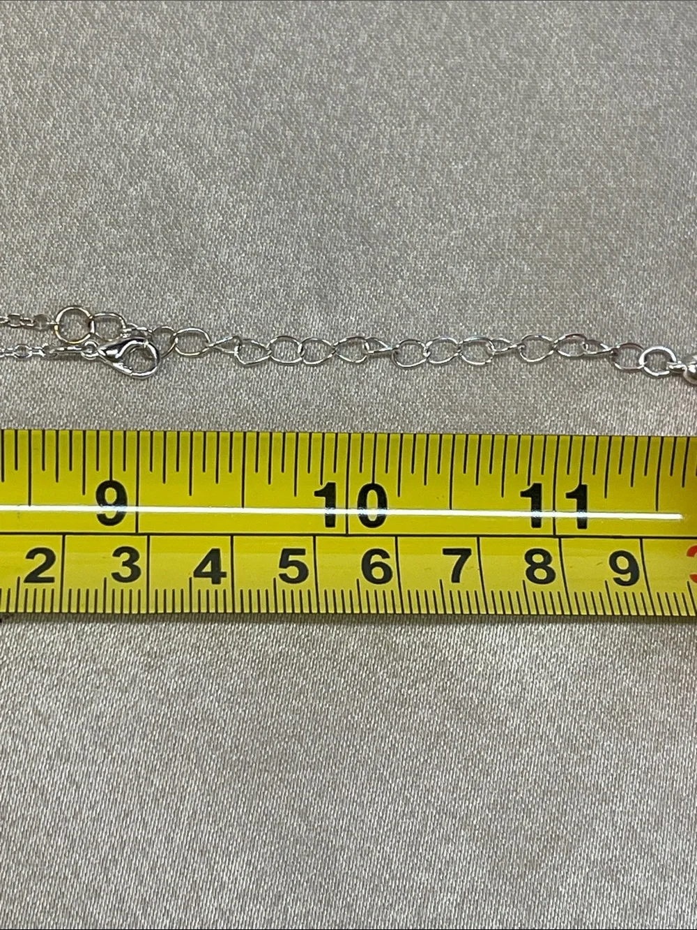 Auburn collegiate silver necklace with AU pendant in blue and orange